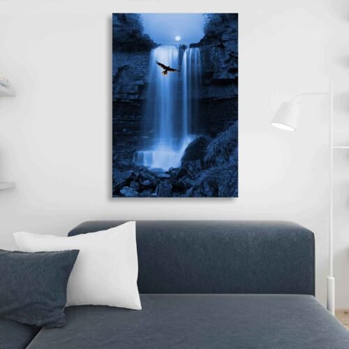 Majestic Serenity Wall Decor - Bird of Prey Soaring by Moonlit Waterfall In this scene, a magnificent bird of prey gracefully hovers against the backdrop of a mesmerizing waterfall, illuminated by the enchanting glow of the moon. The silhouetted details create an aura of mystery and allure, inviting you to explore the wonders of the wilderness.