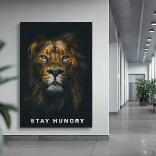 Roar with Ambition - Motivational Lion Wall Art for Modern Offices. Stay Hungry, Stay Foolish. This motivational wall art featuring a majestic lion is the perfect addition to any modern office or home. Inspire yourself and your team with this powerful message. Ideal for entrepreneurs, business leaders, and anyone seeking daily inspiration. Our high-quality canvas prints are designed to last and make a bold statement.